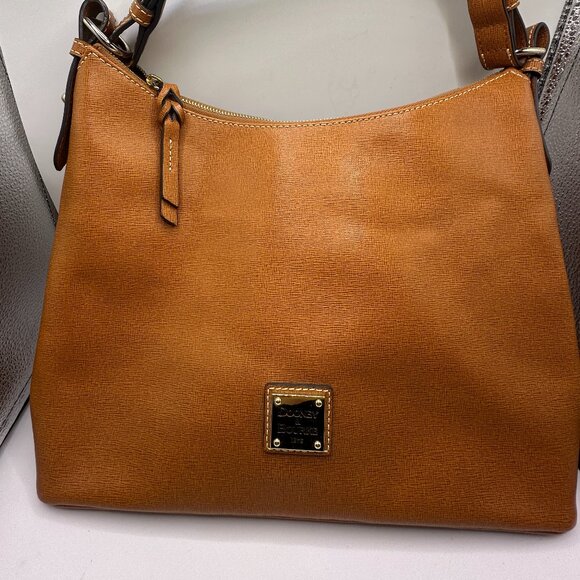 Dooney & Bourke Handbags - Dooney & Bourke Saffiano Leather Hobo Bag – Timeless Elegance & Everyday Use